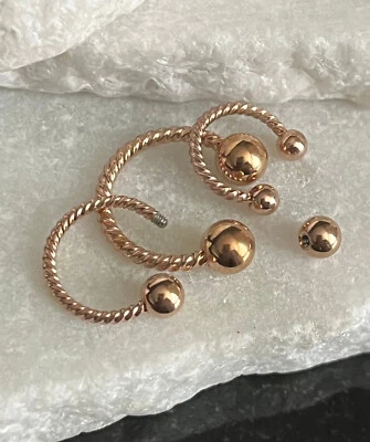 Barra circular estilo cuerda retorcida tabique herradura 1 pieza, ceja, anillo para pezón Foto 1 de 4