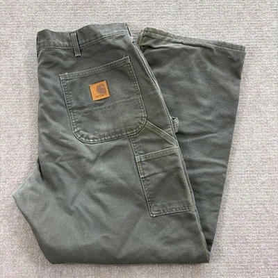 Pantalones de carpintero Carhartt desgastados verde militar forrados con manta para hombre talla 36x30 Foto 1 de 4