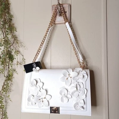 I.N.C. Bandolera International Concepts Vanilla Ajae Floral con Solapa Foto 1 de 4