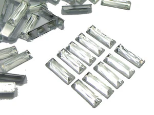 200 gemme strass rettangolari acriliche trasparenti 5 x 15 mm senza foro - Foto 1 di 9