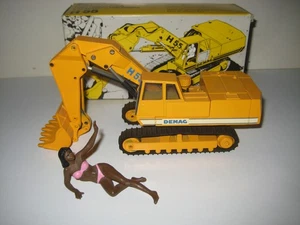 DEMAG H 55 BAGGER HOCHLÖFFEL RAUPEN #113.6 NZG 1:50 OVP - Picture 1 of 5