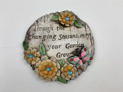 piedra de jardín aunque las estaciones cambiantes que tu jardín crezca flor de mariposa Foto 1 de 3