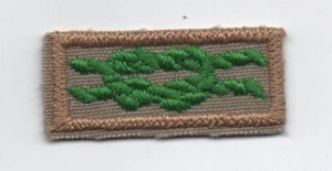 Scouter's Training Knot, Tan Weave, Clear Plastic Backing - Picture 1 of 1