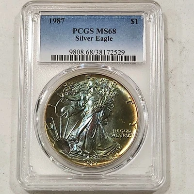 1987 American Silver Eagle ~ PCGS MS68 Rainbow Toned - Image 1 of 4