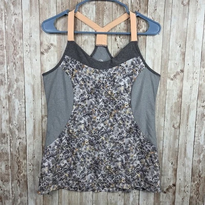 Camiseta sin mangas de entrenamiento atlético MPG para damas talla grande gris floral espalda deportiva elástica Foto 1 de 4