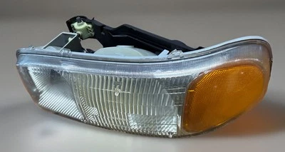 GMC Yukon 1999-2007 + Conjunto de faros laterales izquierdos Sierra OEM 16524543 + bombillas Foto 1 de 4