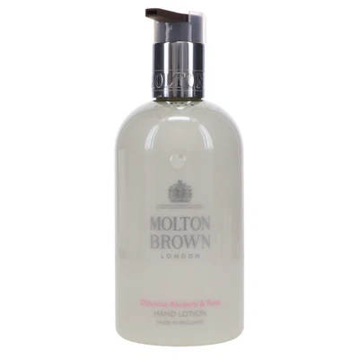 Loción para manos Molton Brown Delicious ruibarbo y rosa 10 oz Foto 1 de 4