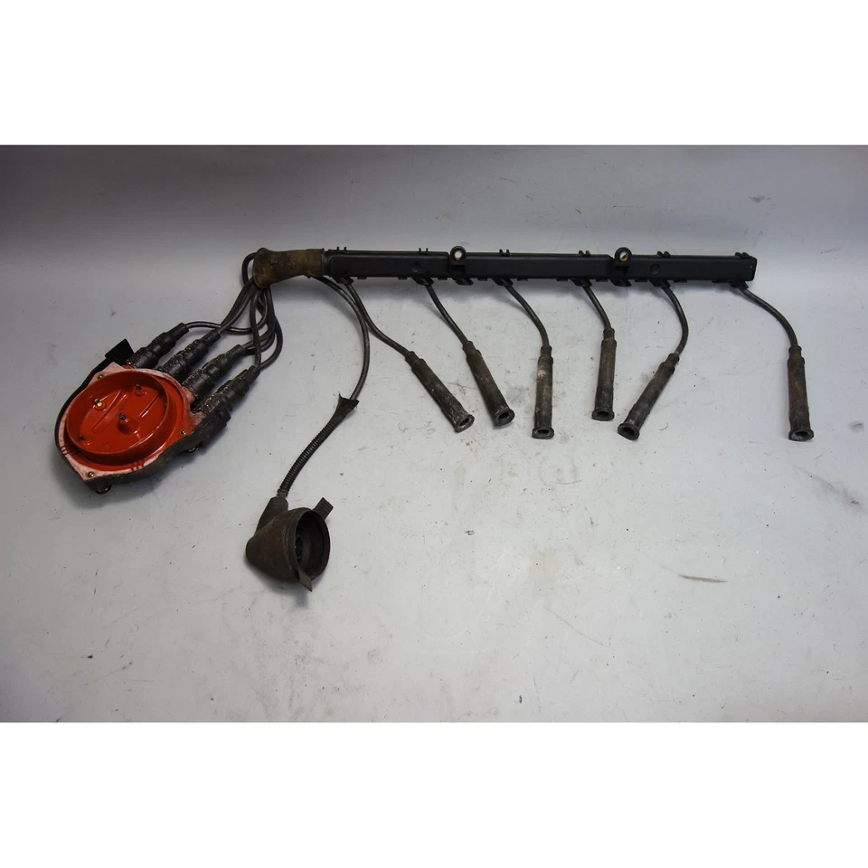 BMW E28 528e M20 1982-1987 cableado de encendido de fábrica de 6 cilindros con tapa de distribuidor OEM Foto 1 de 4