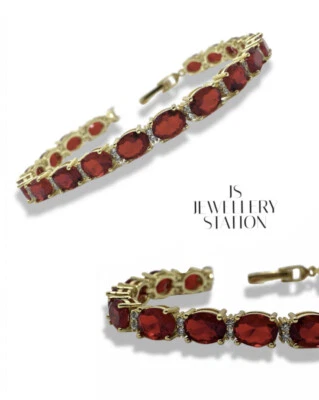 Yellow gold finish red ruby and created diamond Oval tennis bracelet  - Image 1 of 4