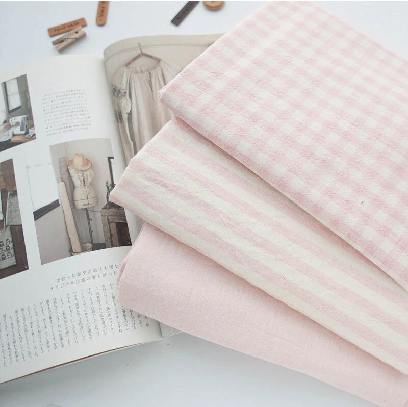 Tela de lavado biológico rosa a rayas a cuadros lisos 160 cm hecha en Corea por yarda Foto 1 de 1