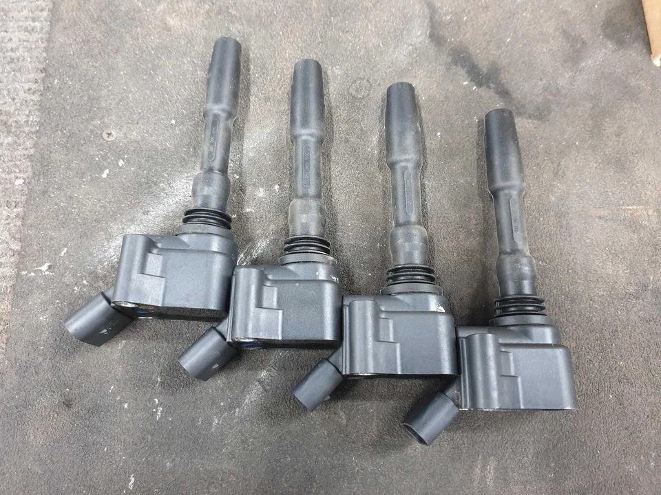 19 20 21 22 23 AUDI Q3  Set of 4 OEM Coil Packs ID# 06H905110P - Image 1 of 4