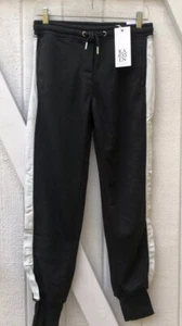 Pantalón de chándal Zoe Karssen Ace negro blanco pequeño tiro bajo calce ajustado cónico P5 - Imagen 1 de 10