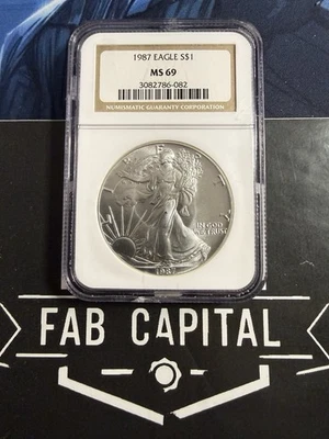 American Silver Eagle 1987 $1 NGC MS69 etiqueta marrón Foto 1 de 2