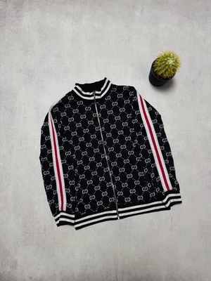 Chaqueta deportiva Gucci monograma GG para hombre talla L azul oblicuo de lujo Foto 1 de 4