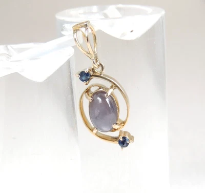 Außergewöhnlicher Anhänger aus 585er Gold mit grauem Sternsaphir und Saphiren - Bild 1 von 4