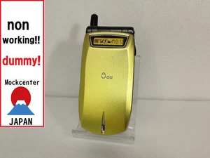 【Mannequin !】 Téléphone portable KYOCERA A1012K (couleur jaune) au-japon non fonctionnel - Photo 1 sur 3