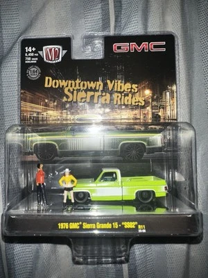 M2 Machines 1976 GMC Sierra Grande 15 SS02 Green Downtown Vibes Diorama NUEVO Foto 1 de 2
