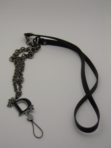 Accessorio ciondolo catena Christian Dior in pelle nera