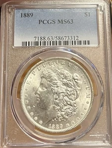 1889 PCGS MS63 Morgan Silver Dollar - Picture 1 of 4