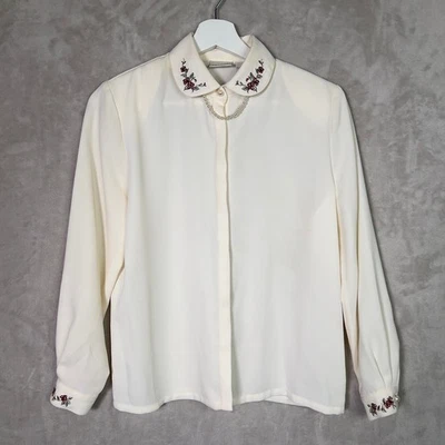 Blusa vintage Koret Petite 4 botones manga larga marfil bordado perla Foto 1 de 4