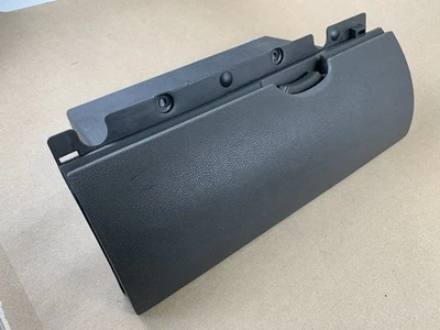 Nissan Pathfinder Frontier Xterra 2005-2012 compartimento superior guantera OEM gris Foto 1 de 4