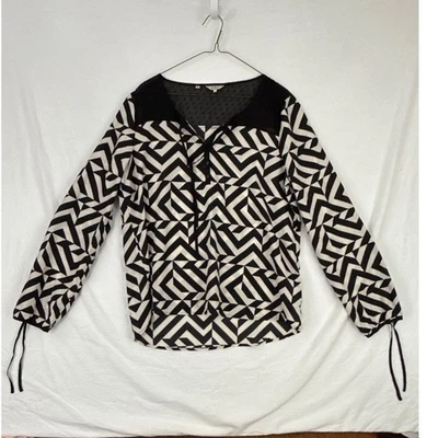 Blusa Top Guess Blanco y Negro Estampado Geométrico Manga Larga - Talla L Foto 1 de 4