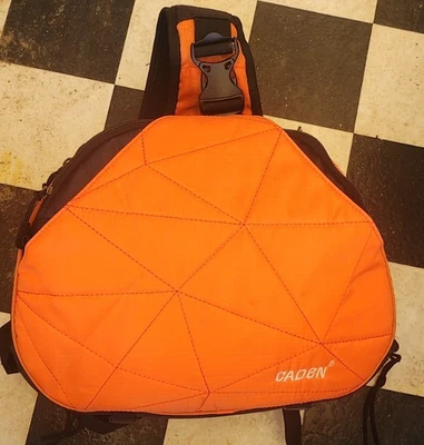 Bolso Bandolera Caden Naranja Negro Cámara Correas Ajustables Trípode Lazos Foto 1 de 4