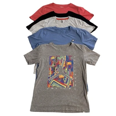 Lote de 5 camisas manga corta L y XL New Balance, Jordan, Cat & Jack, etc. para niños Foto 1 de 4