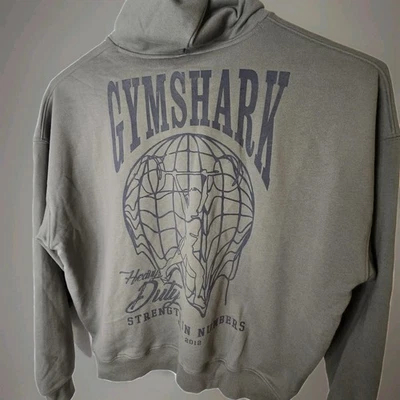 Sudadera con capucha verde grande Gymshark Strength In Numbers para mujer Foto 1 de 4