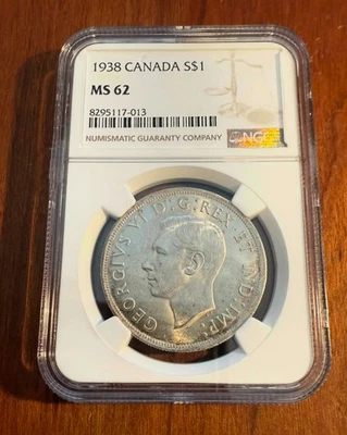 CANADA  GEORGE VI  1938  1 DOLLAR SILVER COIN, UNCIRCULATED, NGC CERTIFIED MS62 - Image 1 of 2