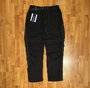 NUEVO PANTALÓN DE EXCURSIONISTA BIDIRECCIONAL DE TAFETÁN DE NAILON AND WANDER PARA HOMBRE EN NEGRO - Imagen 1 de 6