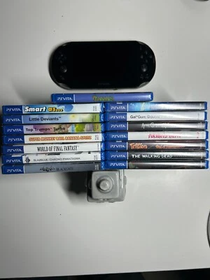 Consola PlayStation PS Vita Gris PCH-2000 LCD CON 2 Tarjetas de Memoria + Lote Juegos SELLADOS Foto 1 de 4