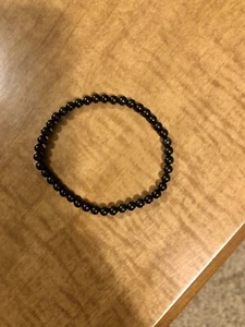 Schwarzes Turmalin Stretcharmband 4 mm - Heilung Edelstein Reiki Naturstein - Bild 1 von 2