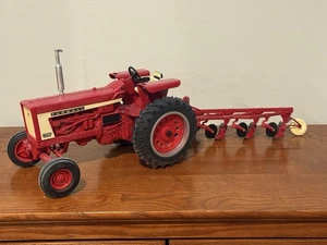 Ertl 1:16 McCormick Farmall 706 Tractor With Plow DEALER EDITION with BOX! - Picture 1 of 6