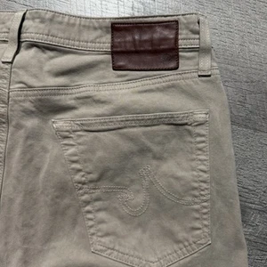 AG Adriano Goldschmied Jeans Men's 33x32 The Graduate Sueded Tailored Leg Khaki - Picture 1 of 9