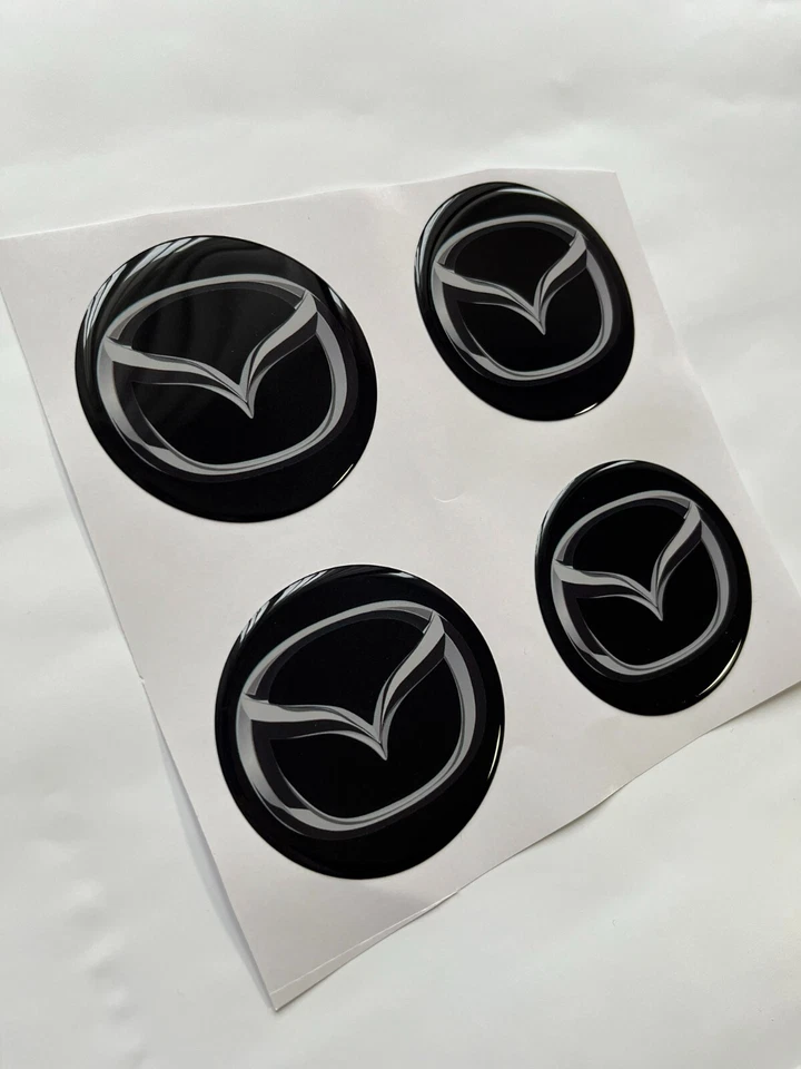 4x Mazda Silikon Felgenemblem Aufkleber Nabenkappen Mitte Radkappe Logo Decal - Изображение 1 из 1