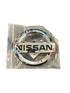 Juke Front Grille Nissan Emblems Badge Logo 2011-2017 Part Number 62890-1KA0A - Picture 1 of 4