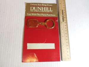 Dunhill La Clase Mundial Llavero Cigarrillo Vintage Promo Tono Dorado Llavero 1985 - Imagen 1 de 8