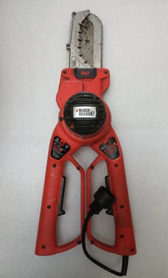 Cortacésped/mini motosierra BLACK+DECKER LP1000 cocodrilo funcionando, cadena afilada Foto 1 de 4
