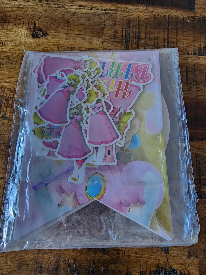 Princess Peach Birthday banner with table decorations - Image 1 of 1