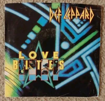 Def Leppard: Love Bites 1987 Mercury Records 7" 45rpm Vinyl Single W/PS VG/VG+ - Image 1 of 4