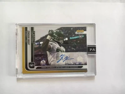 2022 PANINI INSTANT RC ZONOVAN KNIGHT CELEBRATES AFTER FIRST TD GOLD AUTO #7/10 - Image 1 of 2