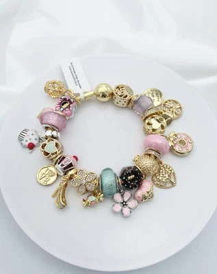 Linx Yellow Gold Bracelet with Gold Pastel And Sweets Themed Charms - Image 1 of 4