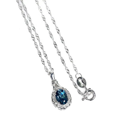 Collana In Argento Sterling 925 Con Topazio Ovale Di Londra 7x5mm E Cz Simulato - Immagine 1 di 4