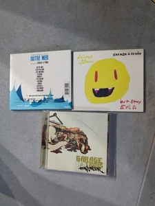Garage à Trois Always Be Happy + Outre Mer +energizer 3 CD einmal gespielt - Bild 1 von 8