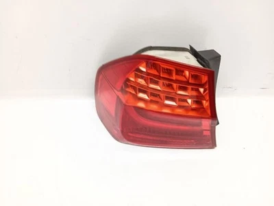 Luz trasera izquierda exterior BMW E90 328i 335i 2009-2011 sedán 63217154157 Foto 1 de 4