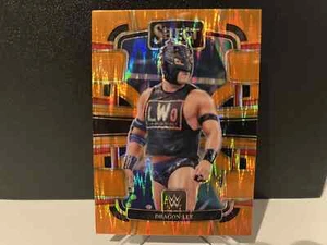 2024 WWE Panini Select Dragon Lee #40 Orange Flash Prizm Card - Picture 1 of 1