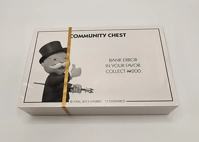 2013 Sellado Nuevo Juego Monopoly Community Cofre, Oportunidad y Cartas de Propiedad Escritura Foto 1 de 2