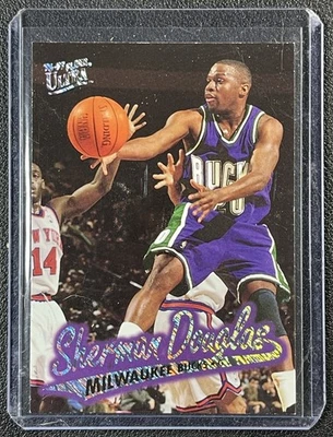 SHERMAN DOUGLAS 1996-97 FLEER ULTRA #P-62 PLATINUM MEDALLION BUCKS - Image 1 of 2