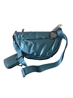 Eslinga de viaje Samantha marrón para llevar media luna con mini bolsillo AZUL METÁLICO nueva con etiquetas Foto 1 de 4